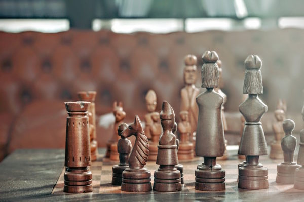Being pwned has nothing to do with chess pieces
